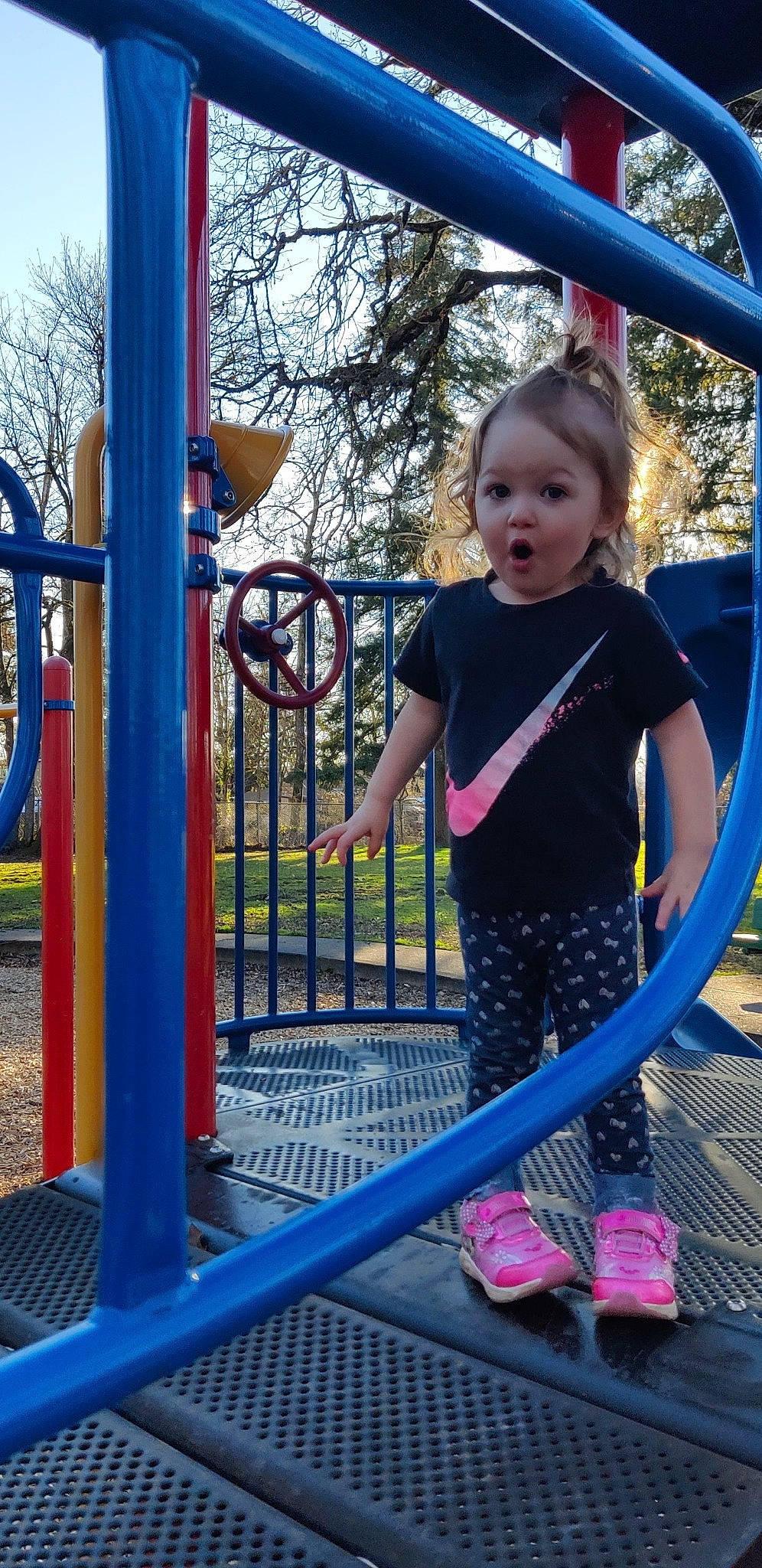 Raeleigh joined the competition — help win amazing prizes! baby_toddler_clothing, blue, child, chute, city, electric_blue, fun, leisure, outdoor_play_equipment, outdoor_recreation, person, play, playground, product, purple, recreation, standing, surprise, t_shirt, toddler