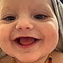 Brayden participe au concours pour gagner de l'argent avec cette photo : baby, smile, face, necklace, beads, closeup, child, skin, mouth, eyes, hand, towel, blanket, happy, infant, cute, expression, portrait, person, indoors
