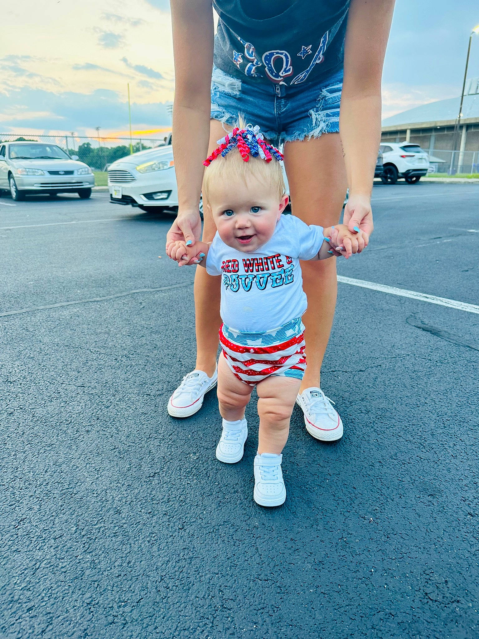 Rayleigh is registered to the contest to win money with this photo: asphalt, baby_toddler_clothing, blue, car, happy, joy, leg, leisure, muscle, person, shorts, sky, sleeve, sneakers, sportswear, standing, summer, t_shirt, thigh, toddler