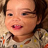 animal_print, baby, child, clothing, cute, eyes, face, hair, halloween, happy, indoors, infant, onesie, portrait, pumpkin, skeleton, smiling, teeth, toddler, young_child