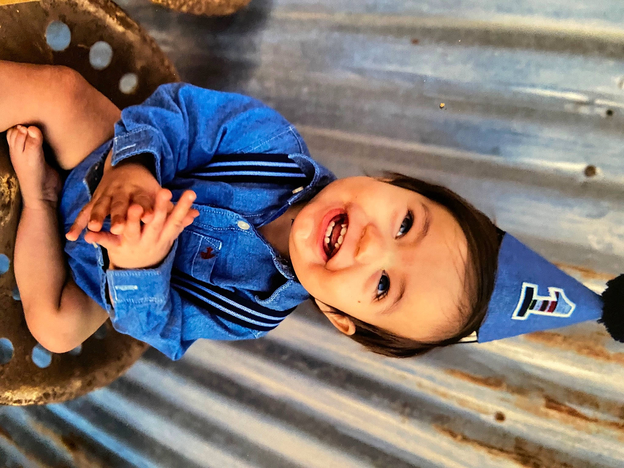 Noah joined the competition — help win amazing prizes! baby, baby_toddler_clothing, child, electric_blue, fun, happy, headgear, leisure, person, portrait_photography, recreation, sitting, skin, smile, toddler, vacation, winter, wood