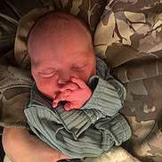 Savannah-Rose joined the competition — help win amazing prizes! newborn, baby, sleeping, hand, blanket, clothing, cozy, infant, person, portrait, soft, warm, rest, closeup, cute, peaceful, wrapped, indoors, tender, young