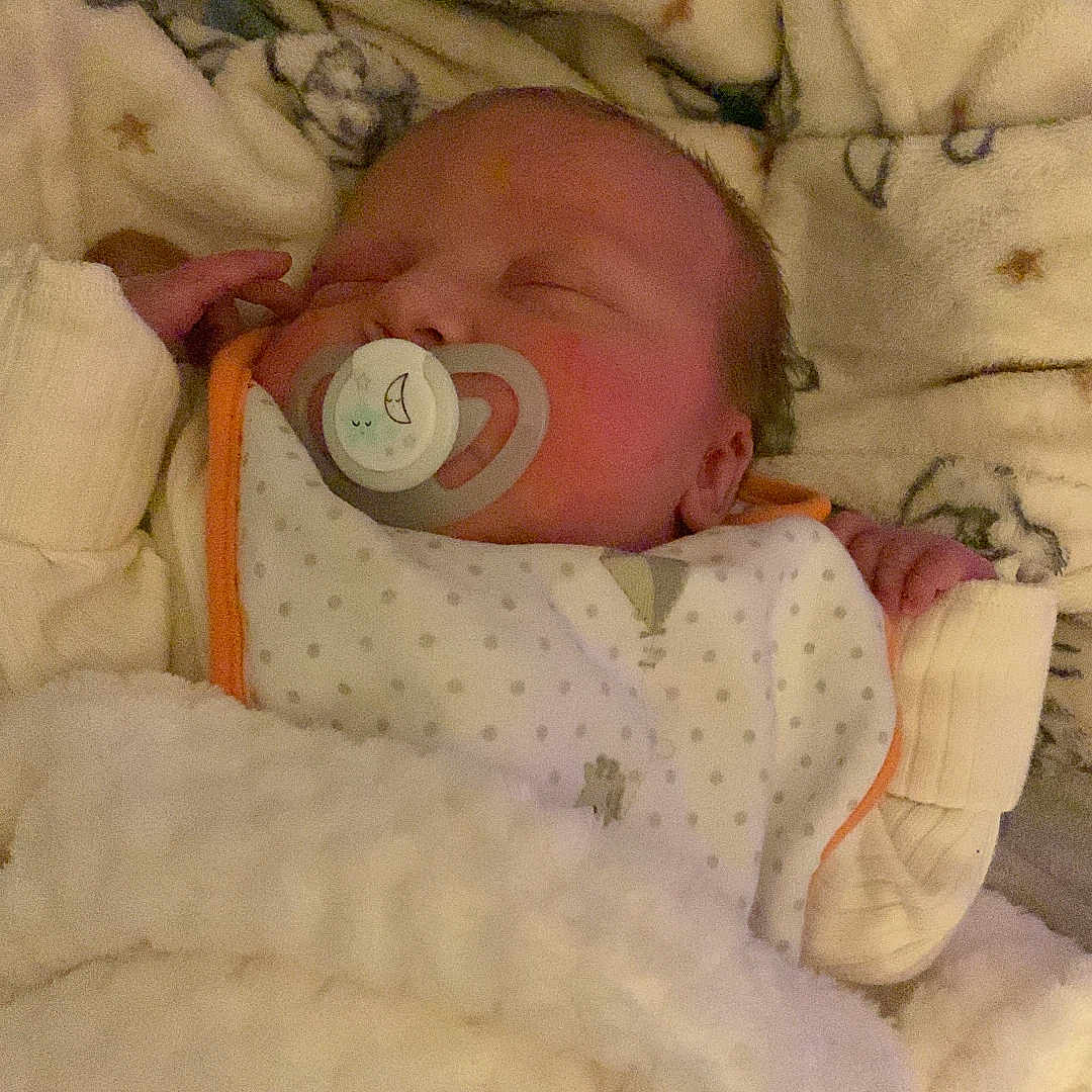 Savannah-Rose is registered to the contest to win money with this photo: baby, baby_bib, bed, blanket, child, clothing, comfort, cozy, cute, cute_face, indoors, infant, newborn, pacifier, peaceful, rest, sleep, sleeping, soft, warm