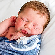 Grayson joined the competition — help win amazing prizes! newborn, baby, sleeping, blanket, blue, white, pillow, infant, face, peaceful, resting, soft, cute, skin, wrapped, peace, child, portrait, closeup, adorable