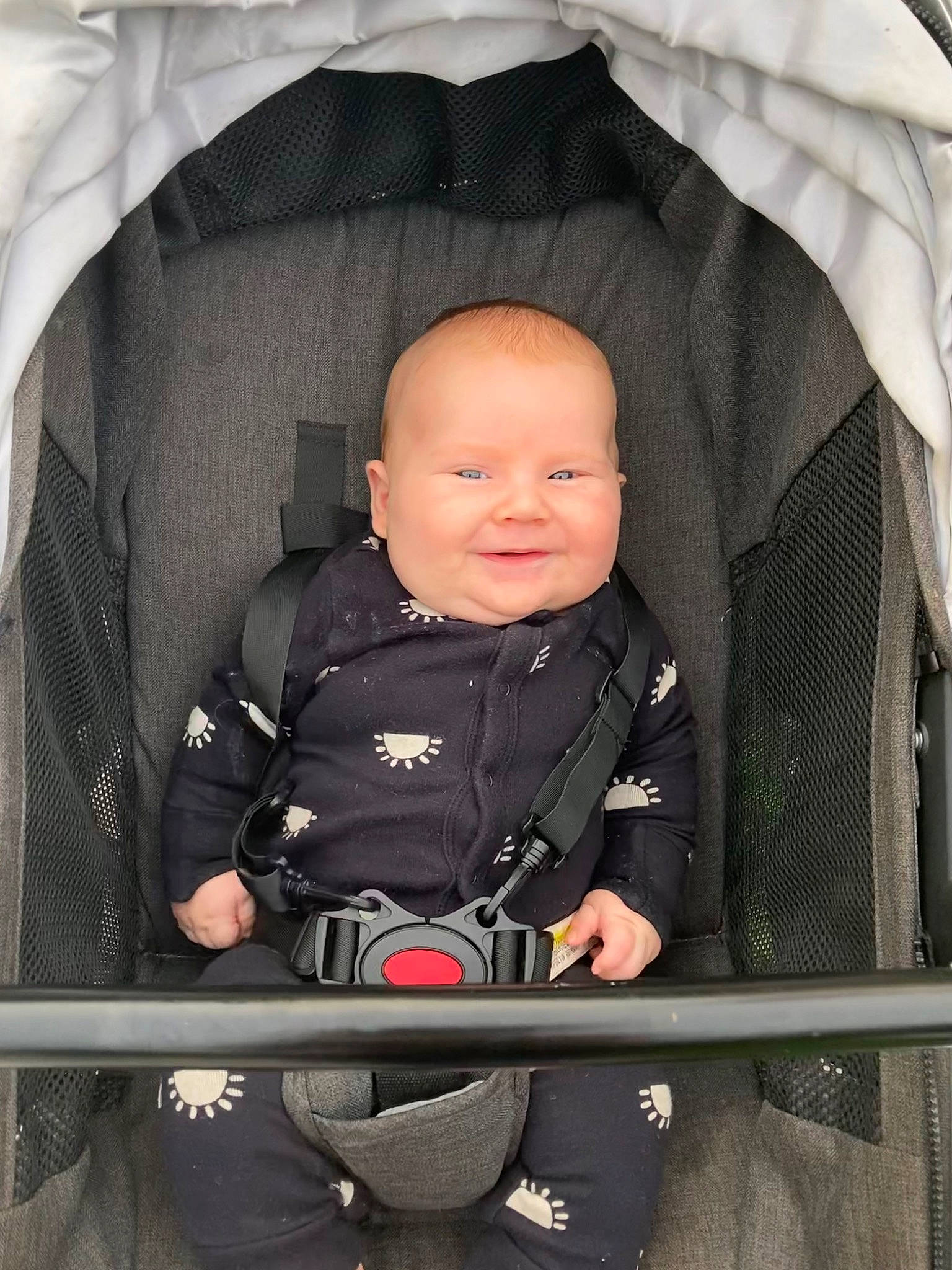 Colter is registered to the contest to win money with this photo: baby, baby_carriage, baby_products, baby_safety, baby_toddler_clothing, black, car_seat, chair, child, comfort, infant_bed, joy, outerwear, person, product, sitting, sleeve, smile, toddler, white