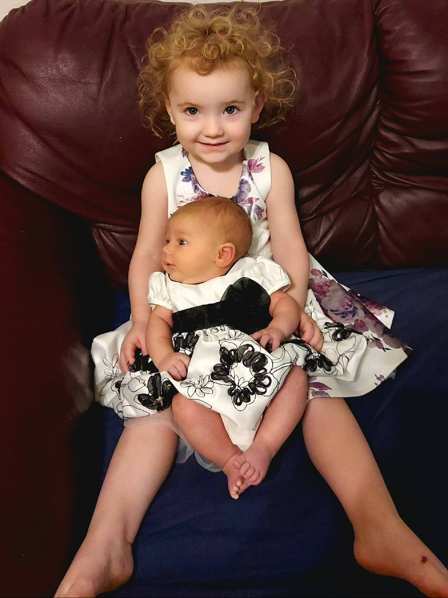 Amelia joined the competition — help win amazing prizes! abdomen, baby, baby_toddler_clothing, child, comfort, couch, flash_photography, foot, fun, happy, head, human_body, human_leg, joy, knee, lap, person, sleeve, smile, thigh