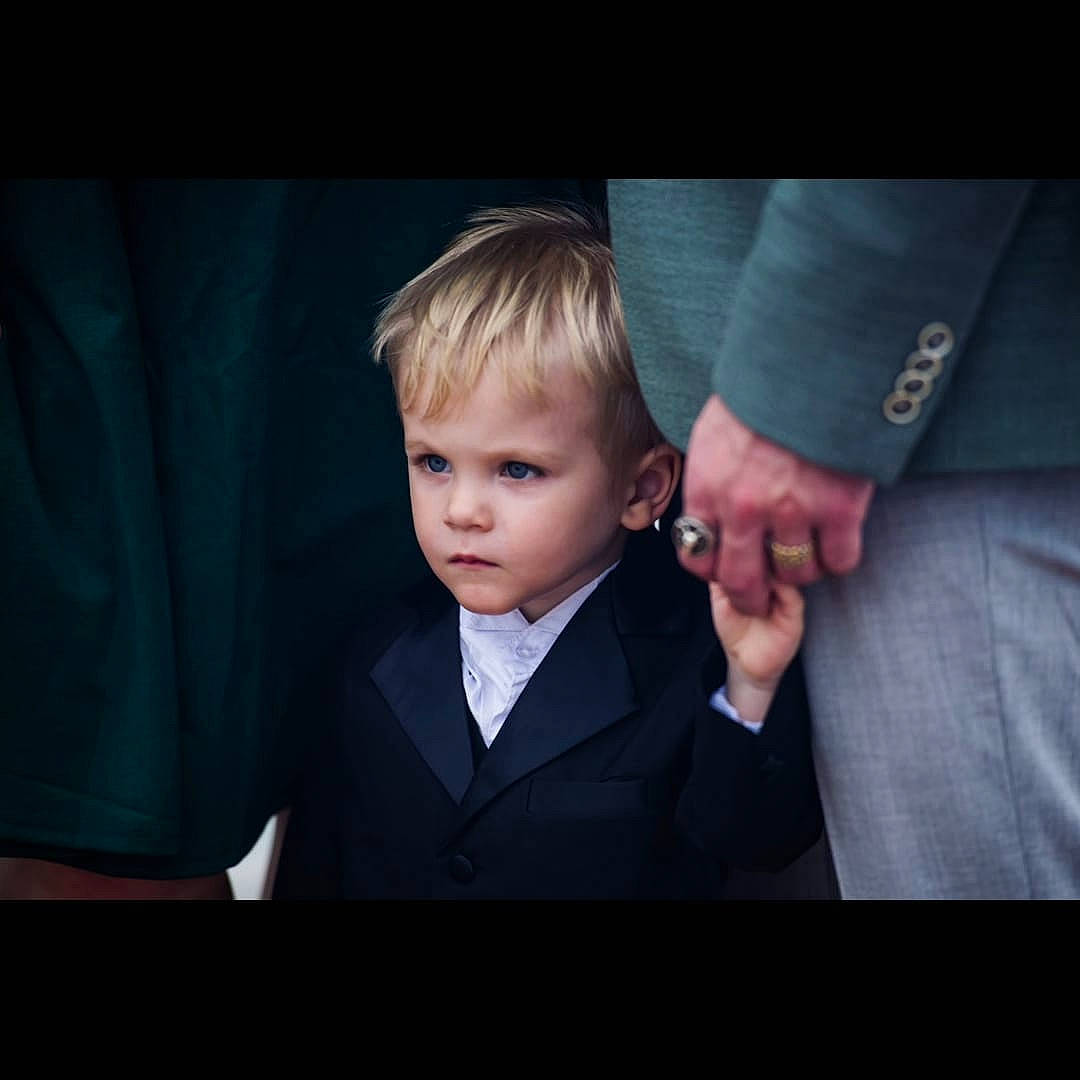 Aidan joined the competition — help win amazing prizes! blazer, darkness, dress_shirt, electric_blue, event, fashion_accessory, flash_photography, formal_wear, fun, gesture, happy, love, outerwear, person, photo_caption, sitting, sleeve, suit, toddler, tuxedo