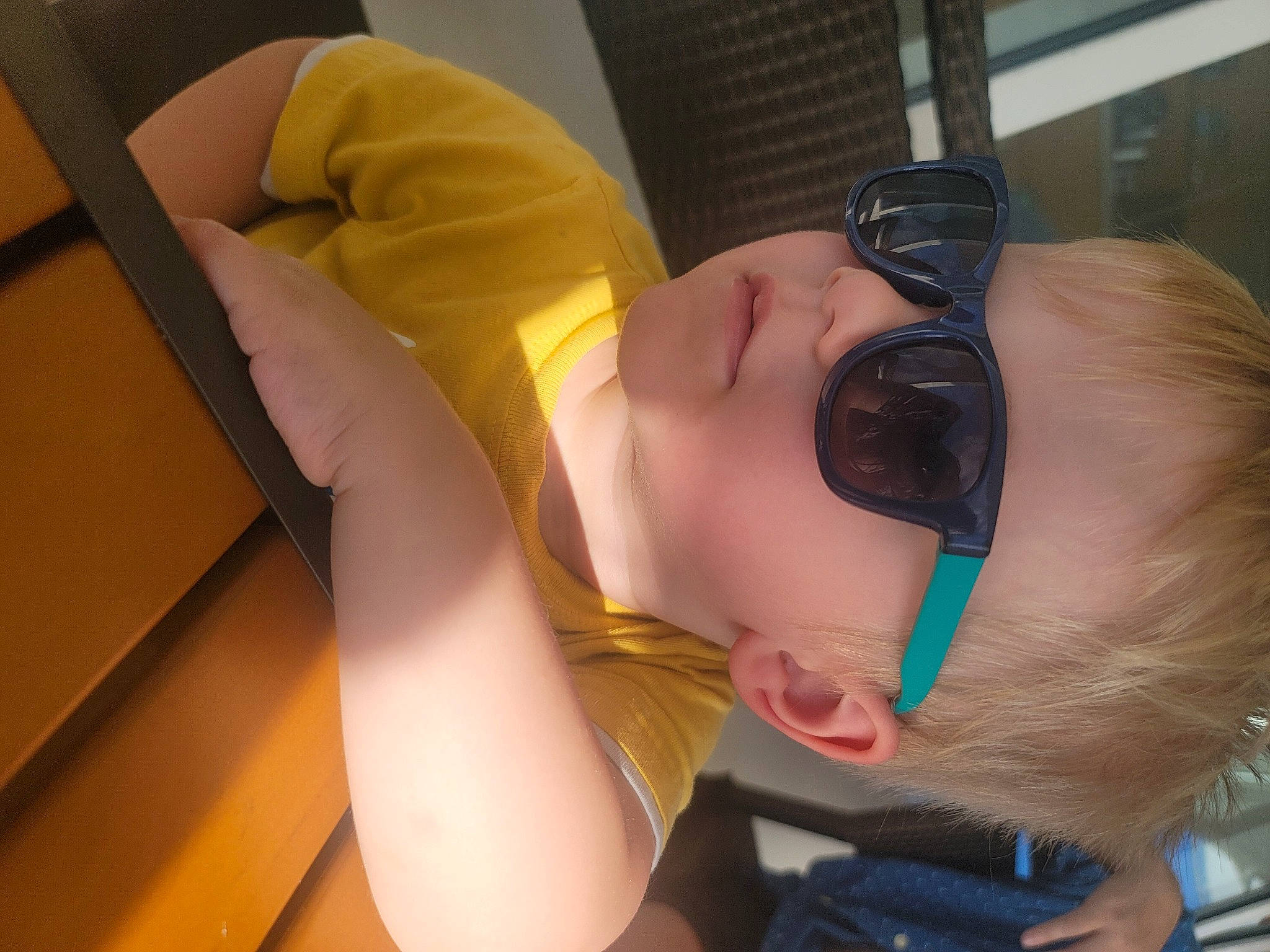 Aidan is registered to the contest to win money with this photo: black_hair, chest, comfort, ear, eye, eyebrow, eyelash, eyewear, glasses, goggles, headgear, human_body, jaw, mouth, neck, nose, person, personal_protective_equipment, sunglasses, thigh