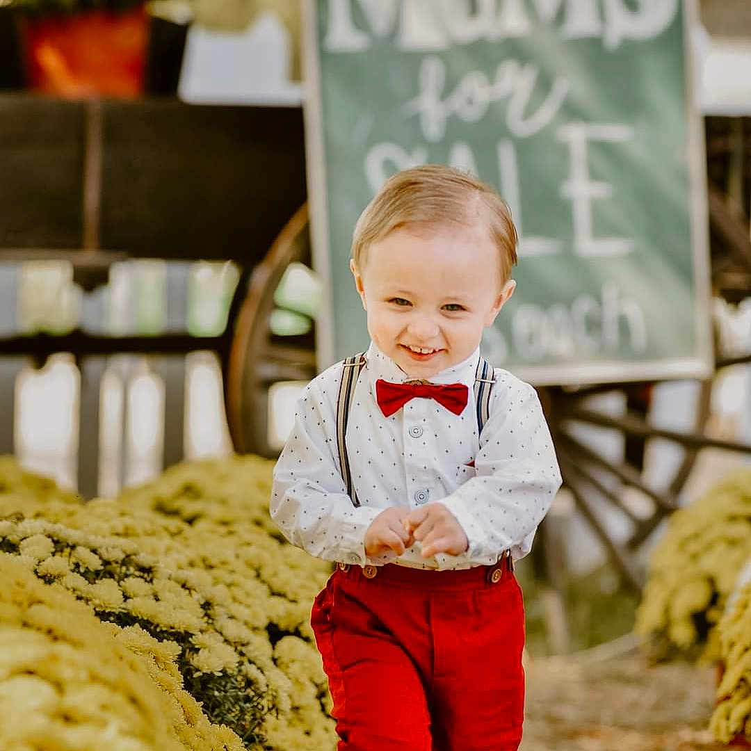 Jesse joined the competition — help win amazing prizes! blonde, boy, child, clothing, coat, face, formalwear, hair, happy, head, jacket, jeans, male, pants, person, photography, portrait, sitting, smile, suit