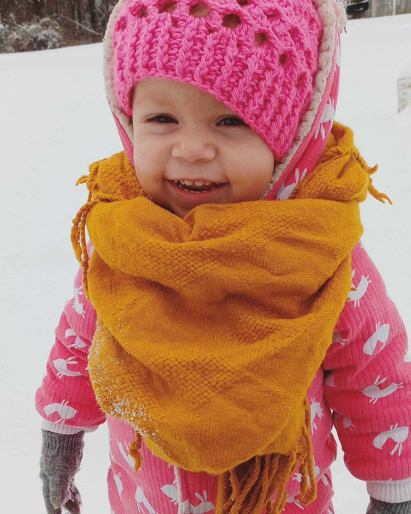 Waylene is registered to the contest to win money with this photo: baby, baby_toddler_clothing, cap, cool, face, happy, head, headgear, headwear, jacket, magenta, person, photograph, pink, red, skin, sleeve, smile, stole, textile