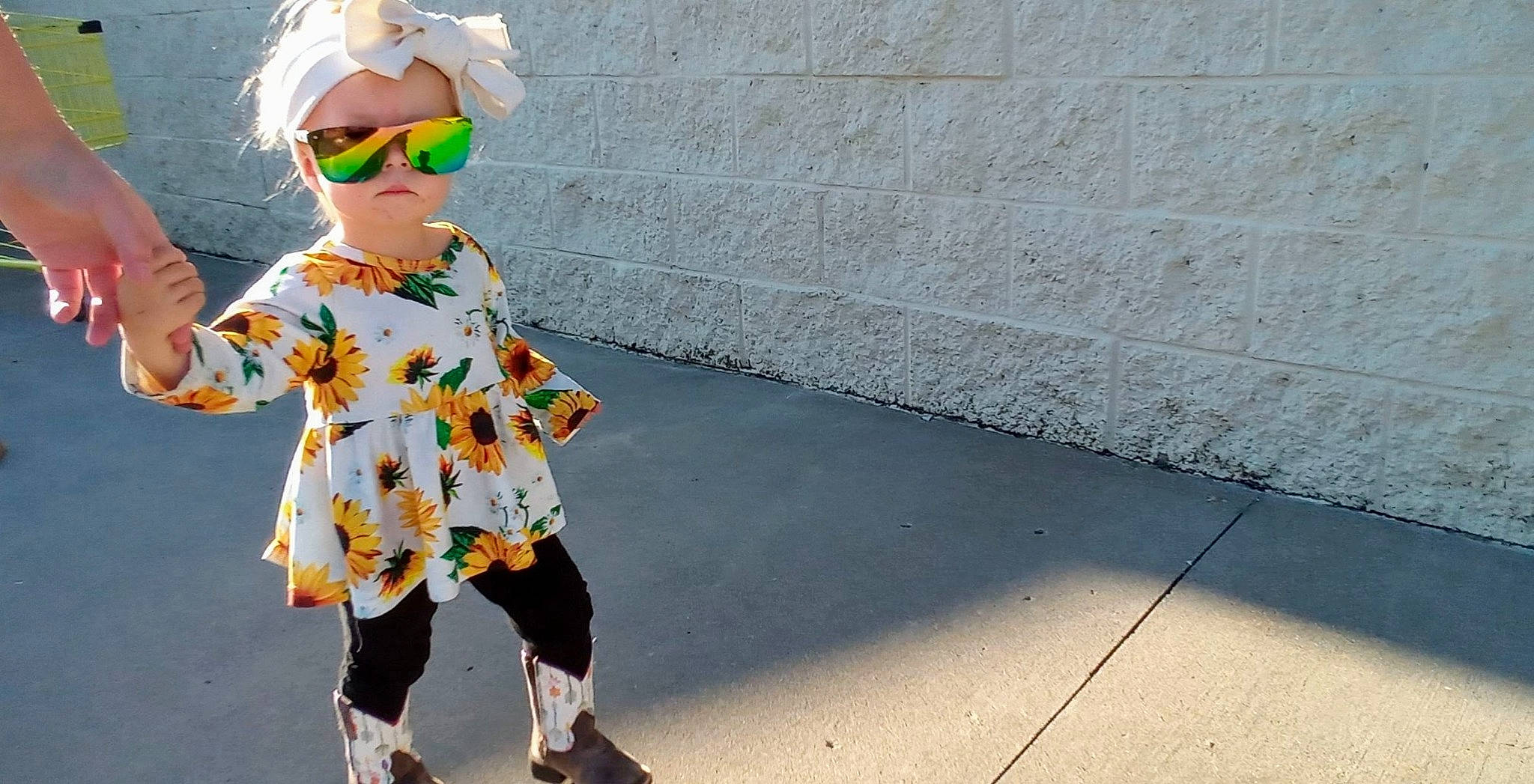 Waylene joined the competition — help win amazing prizes! asphalt, electric_blue, entertainment, eyewear, fashion_accessory, fashion_design, goggles, pattern, person, personal_protective_equipment, recreation, road, sidewalk, sleeve, sportswear, street_fashion, sunglasses, t_shirt, toddler, toy