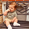Zain joined the competition — help win amazing prizes! toddler, child, bench, outdoor, brick_wall, window, green_shirt, shorts, socks, cute, smiling, baby, seat, metal_bench, sitting, happy, young_child, portrait, casual_clothing, daylight