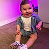 Zain joined the competition — help win amazing prizes! toddler, child, baby, indoor, carpet, sitting, smiling, clothing, shoes, purple_light, happy, cute, portrait, baby_face, shorts, shirt, sock, young_child, person, floor