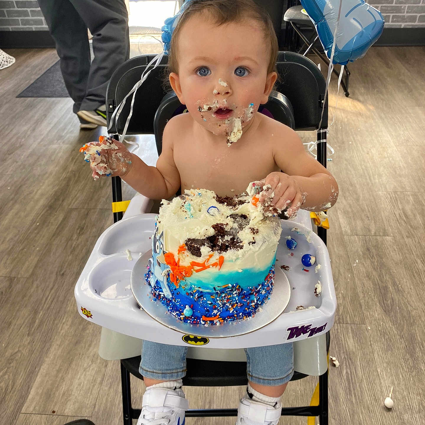 Hunter is registered to the contest to win money with this photo: baby, birthdaycake, birthdayparty, boy, cake, chair, child, clothing, cream, dessert, eating, food, footwear, fun, furniture, male, party, people, person, shoe