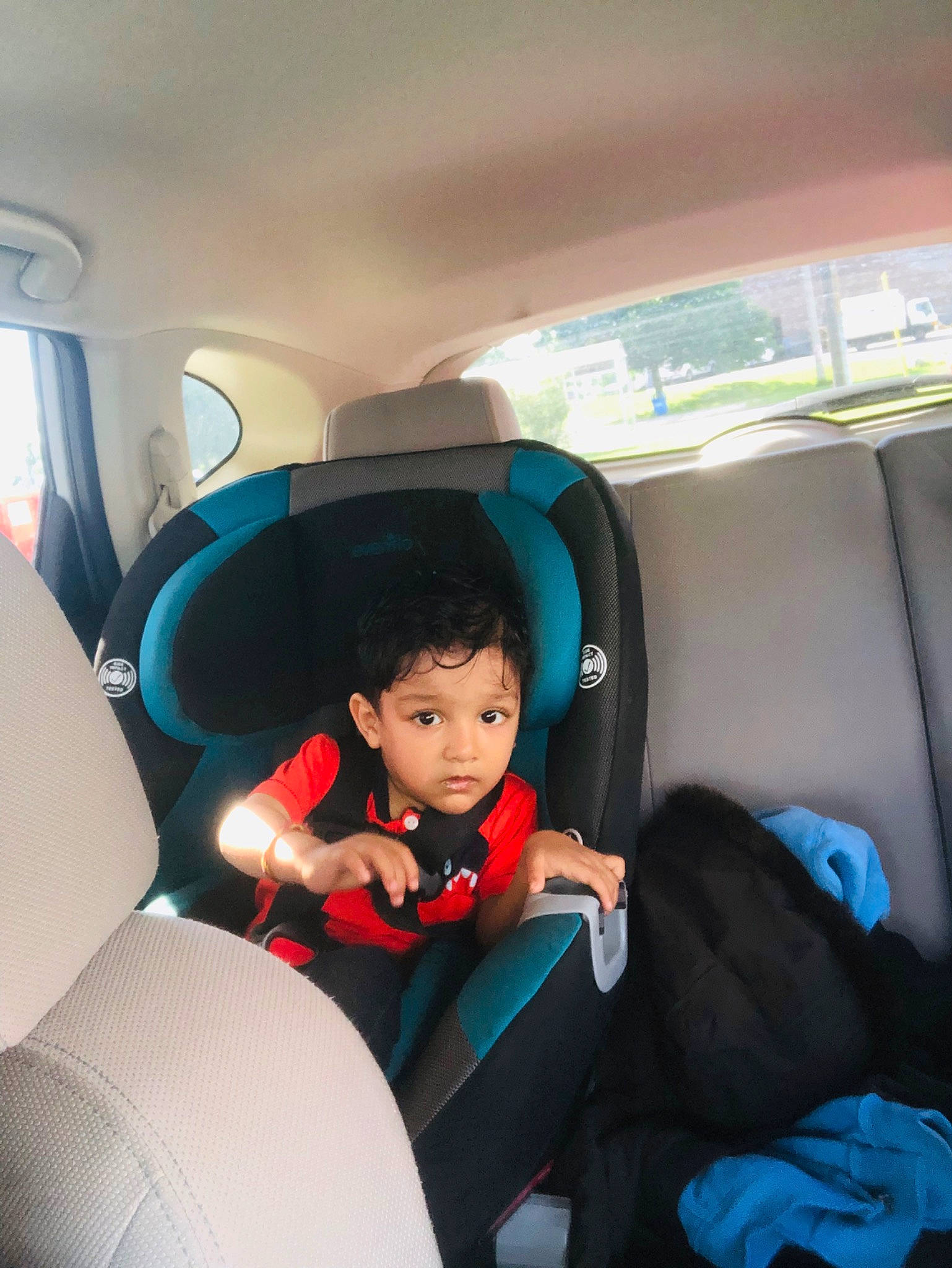 Ayan joined the competition — help win amazing prizes! airline, auto_part, baby_in_car_seat, car, car_seat, child, family_car, head_restraint, luxury_vehicle, passenger, person, plant, sitting, toddler, transport, vacation, vehicle