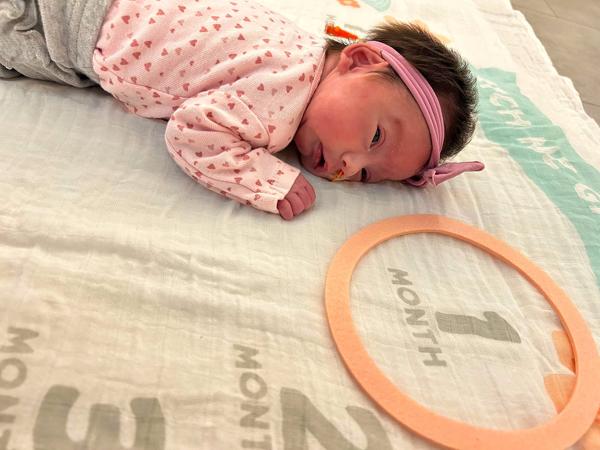 Iris joined the competition — help win amazing prizes! baby, baby_sleeping, baby_toddler_clothing, bedding, bedtime, child, circle, comfort, eye, flooring, font, happy, headwear, linens, pattern, person, room, skin, t_shirt, textile