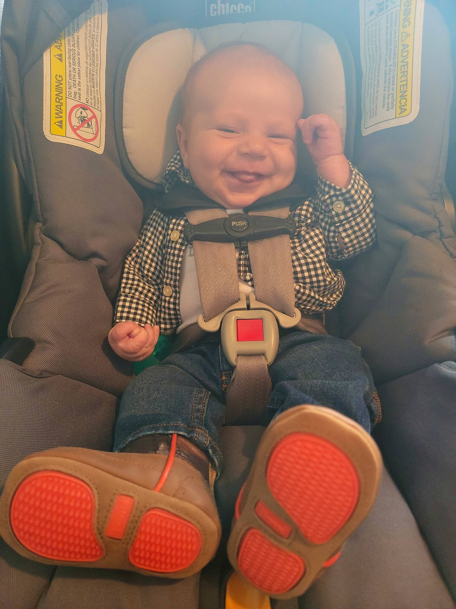 James is registered to the contest to win money with this photo: air_travel, auto_part, baby, baby_products, car_seat, car_seat_cover, comfort, face, happy, head, human_body, human_leg, joy, mouth, passenger, person, seat_belt, sitting, smile, thigh