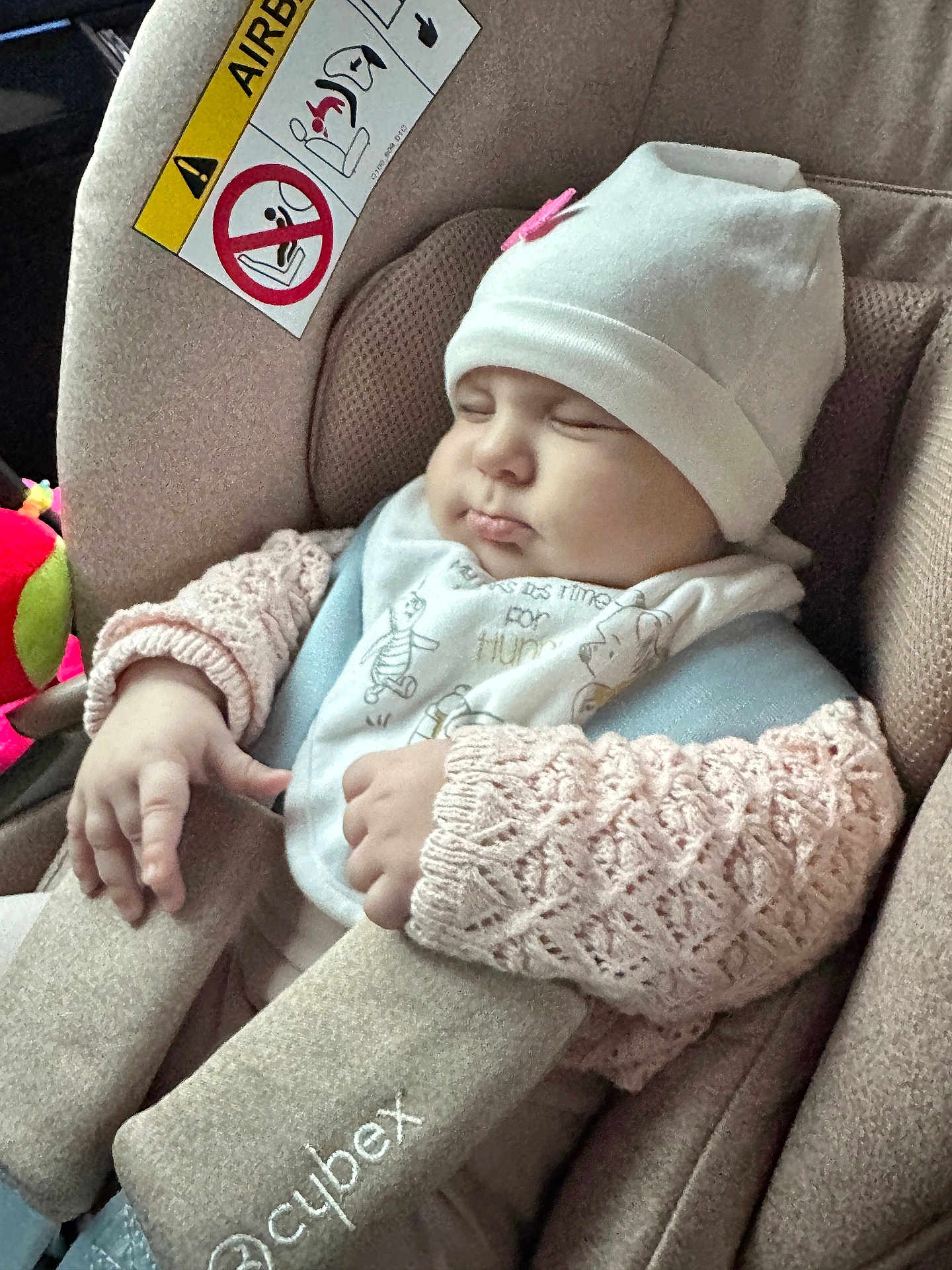 Leila joined the competition — help win amazing prizes! baby, car_seat, sleeping, hat, knitted_sweater, child, infant, soft_fabric, car_interior, seat_belt, cute, peaceful, napping, face, hand, clothing, comfort, child_safety, transportation, car
