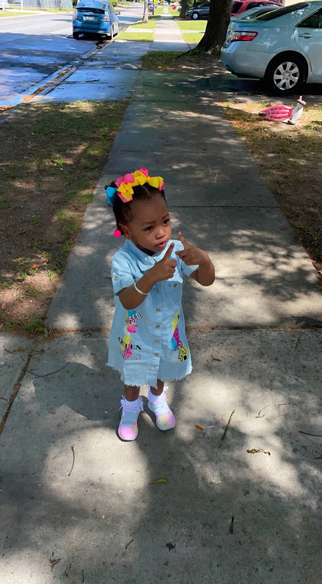 Saige Moriah is registered to the contest to win money with this photo: asphalt, baby, baby_toddler_clothing, child, family_car, fun, grass, happy, hat, leisure, person, play, recreation, road, road_surface, shadow, sidewalk, tints_and_shades, tire, toddler