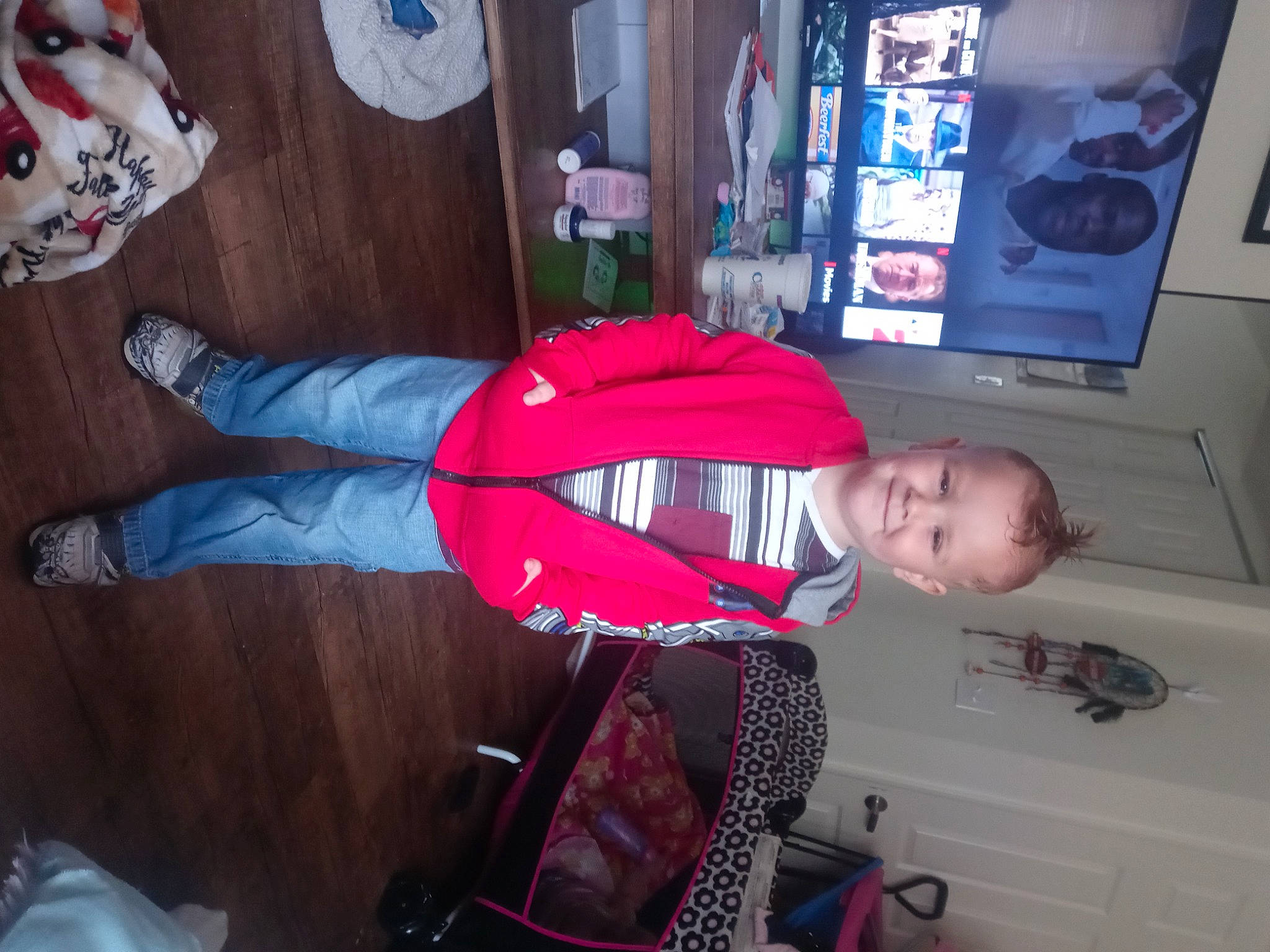 Jeffrey joined the competition — help win amazing prizes! carmine, child, costume, electric_blue, fictional_character, flooring, fun, hardwood, human_leg, joy, knee, lap, luggage_and_bags, person, picture_frame, room, sportswear, standing, t_shirt, thigh