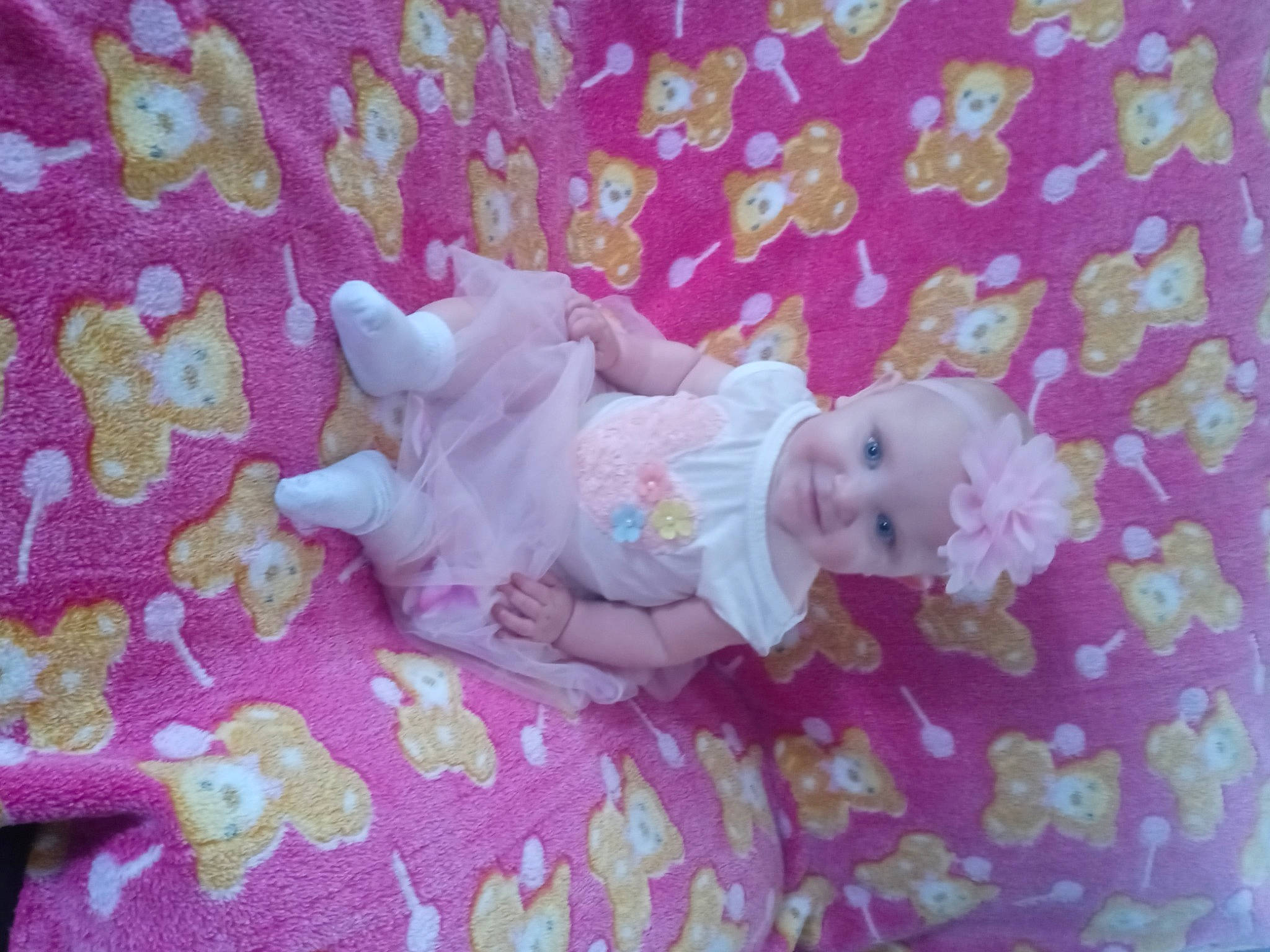 Haley joined the competition — help win amazing prizes! baby, baby_products, baby_toddler_clothing, baby_toys, child, doll, headwear, linens, magenta, pattern, person, petal, pink, purple, room, sock, toddler, toy
