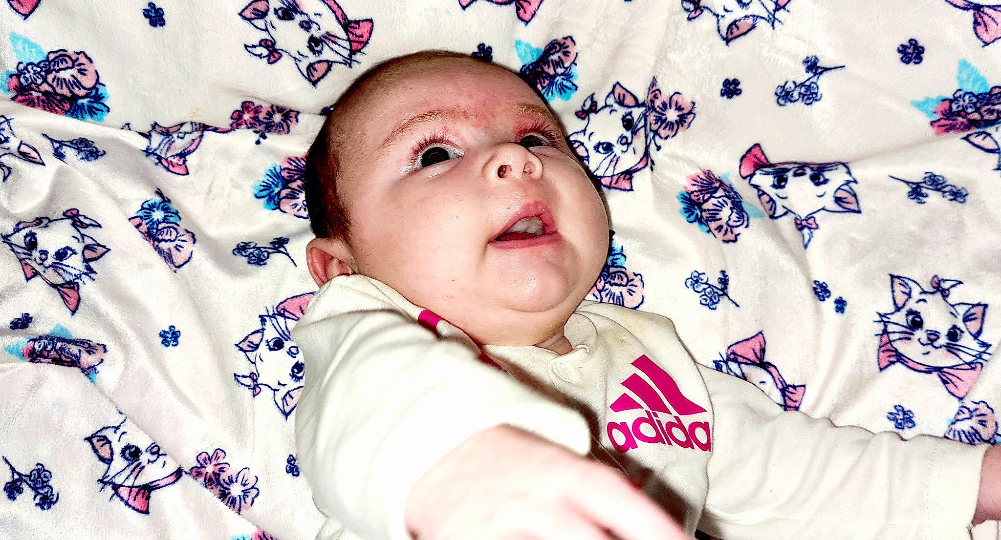 Malya a rejoint le concours — aidez-le/la à gagner de superbes lots ! baby, baby_products, baby_sleeping, baby_toddler_clothing, cheek, child, fashion_accessory, fun, happy, linens, magenta, pattern, people_in_nature, person, portrait_photography, product, skin, sleeve, smile, textile