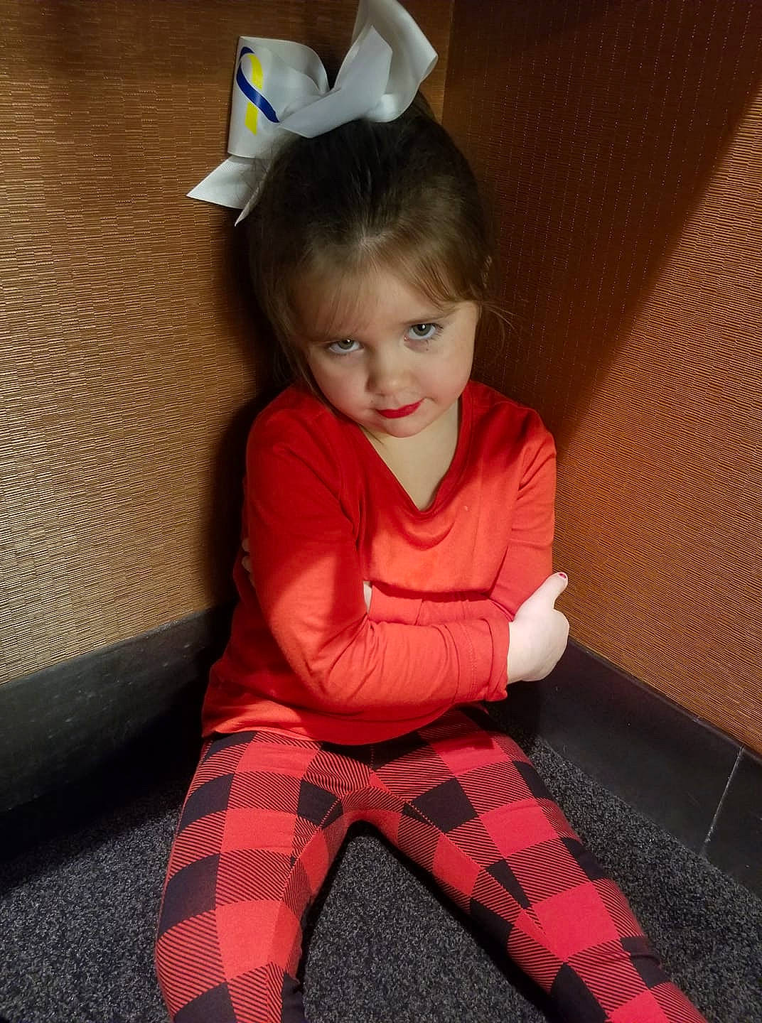 Izabelle is registered to the contest to win money with this photo: arm, child, child_model, christmas, costume, design, ear, head, leg, pattern, person, pink, play, sitting, skin, toddler