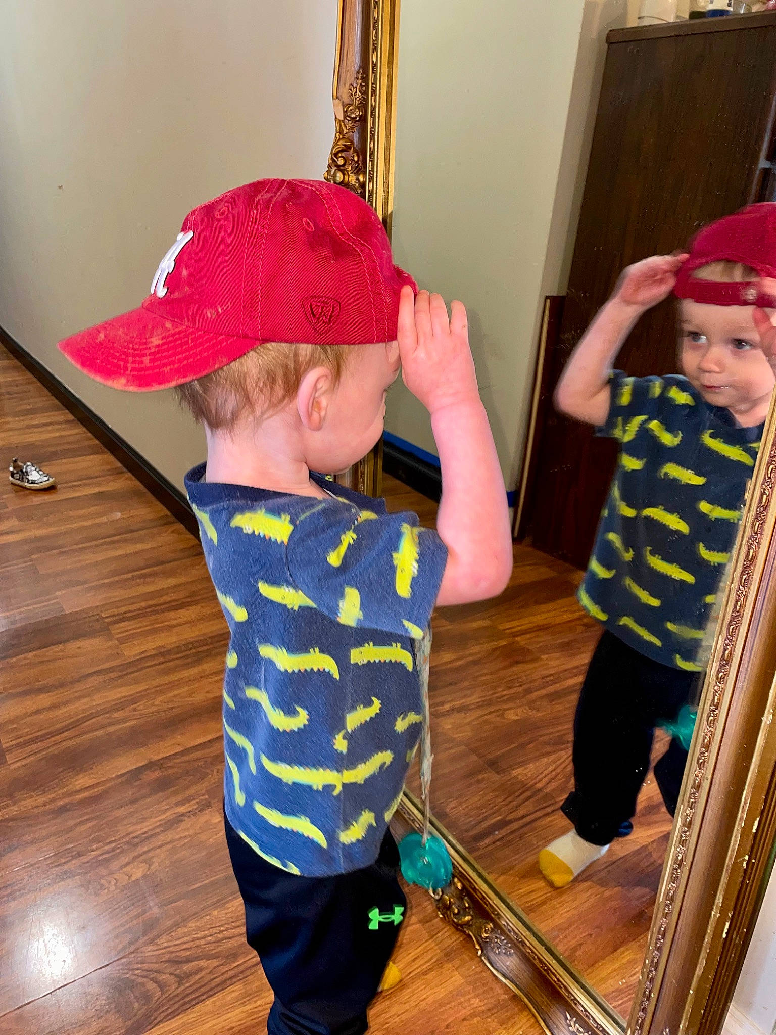 Hendrix joined the competition — help win amazing prizes! baby, baby_toddler_clothing, cap, child, door, flooring, fun, hardwood, headwear, magenta, party_supply, pattern, person, play, room, sleeve, standing, t_shirt, textile, toddler