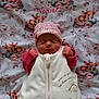 Noèline participe au concours pour gagner de l'argent avec cette photo : baby, newborn, infant, sleeping, hat, blanket, deer_pattern, floral, pink, sleepwear, cozy, portrait, bedding, nursery, cute, peaceful, small_hands, soft_tone, textile, swaddle