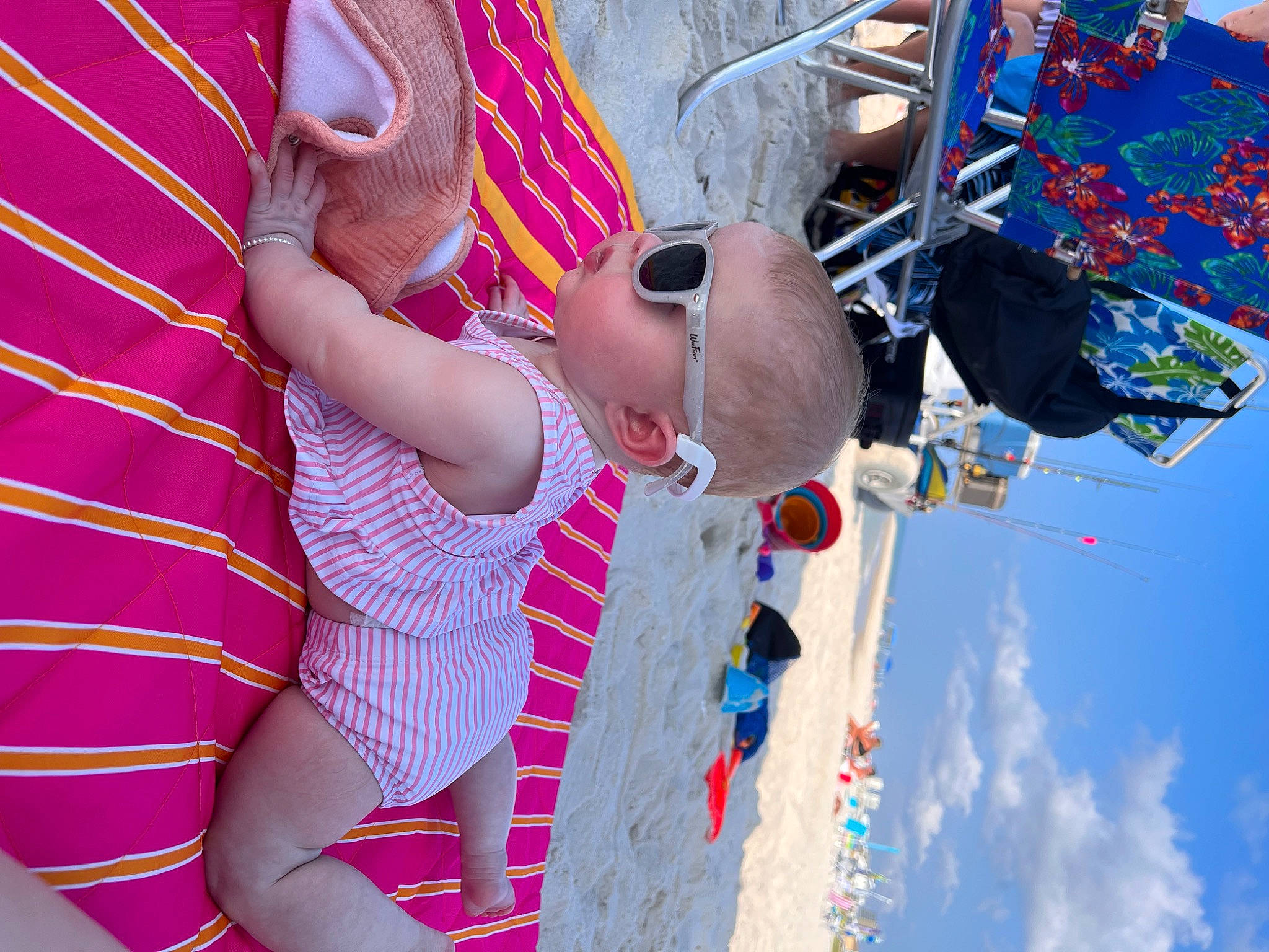 Katie joined the competition — help win amazing prizes! baby, baby_toddler_clothing, child, cloud, event, eyewear, fashion_accessory, fun, happy, leisure, magenta, pattern, person, pink, play, recreation, sky, sunglasses, toddler, travel