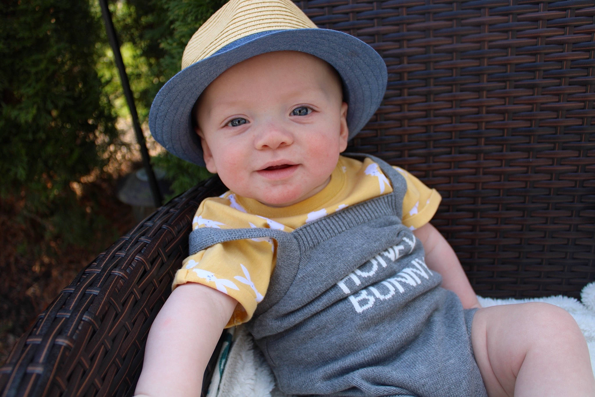 Fisher is registered to the contest to win money with this photo: baby, baby_toddler_clothing, cap, cheek, child, fashion_accessory, flash_photography, fun, grass, happy, hat, headwear, lip, person, skin, sleeve, smile, sun_hat, t_shirt, tartan