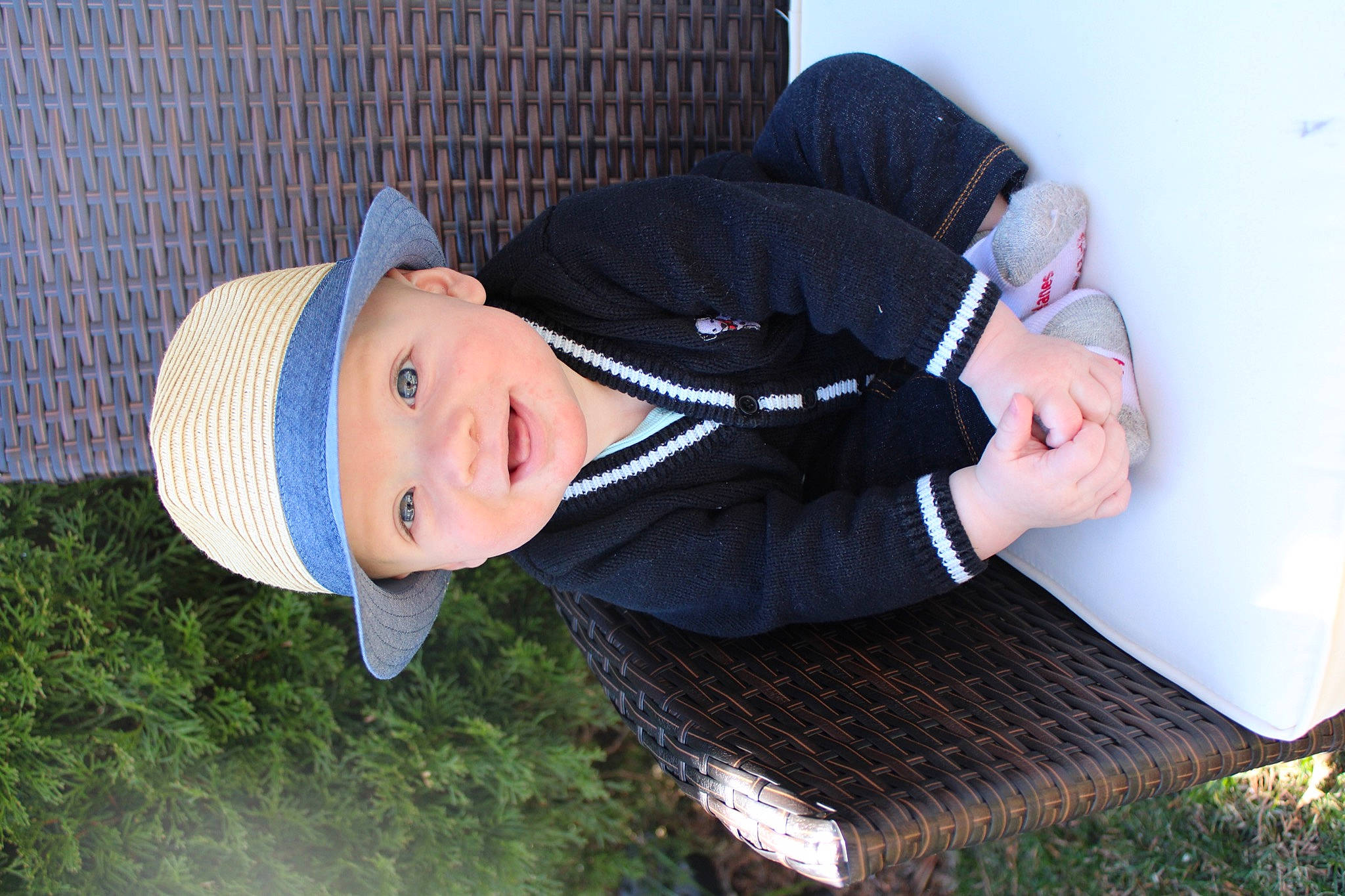 Fisher joined the competition — help win amazing prizes! baby_toddler_clothing, cap, child, comfort, fun, grass, happy, hat, headgear, headwear, human_body, mammal, outerwear, people, person, sleeve, smile, sun_hat, textile, toddler
