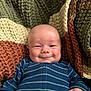 Cameron is registered to the contest to win money with this photo: baby, bed, blanket, clothing, couch, cushion, face, furniture, happy, head, homedecor, newborn, pants, person, photography, portrait, quilt, sleeping, smile, t_shirt