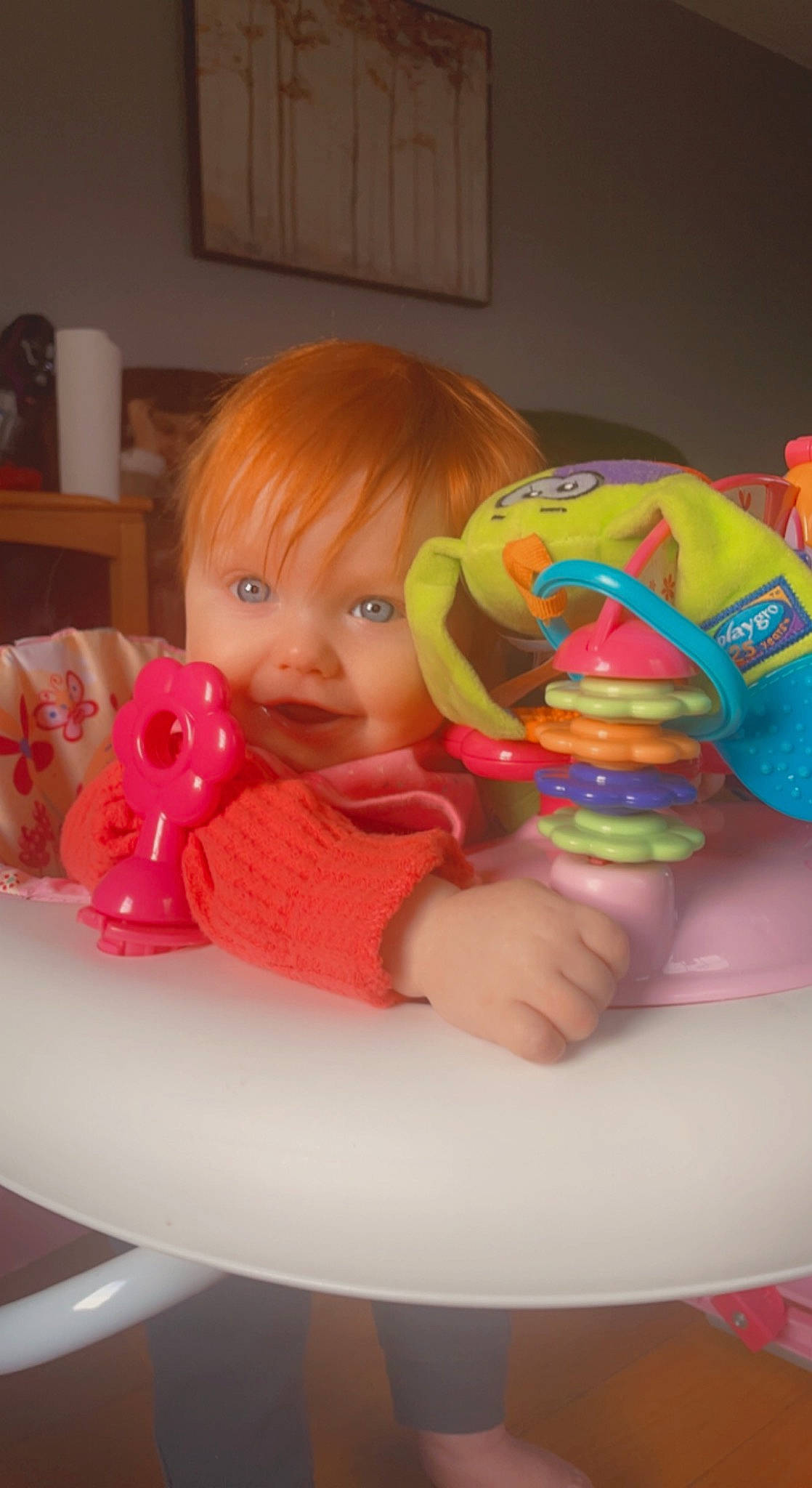 Chloe joined the competition — help win amazing prizes! baby, baby_playing_with_toys, baby_products, baby_toddler_clothing, baby_toys, chair, child, finger, fun, happy, party_supply, person, pink, play, room, sitting, smile, stuffed_toy, sweetness, toddler