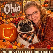 Harley joined the competition — help win amazing prizes! autumn, carved_pumpkin, dog, face, fall, glasses, leaves, ohio, orange, outdoor, person, portrait, pug, pumpkin, scarf, seasonal_decor, state, sweater, text_overlay, woman