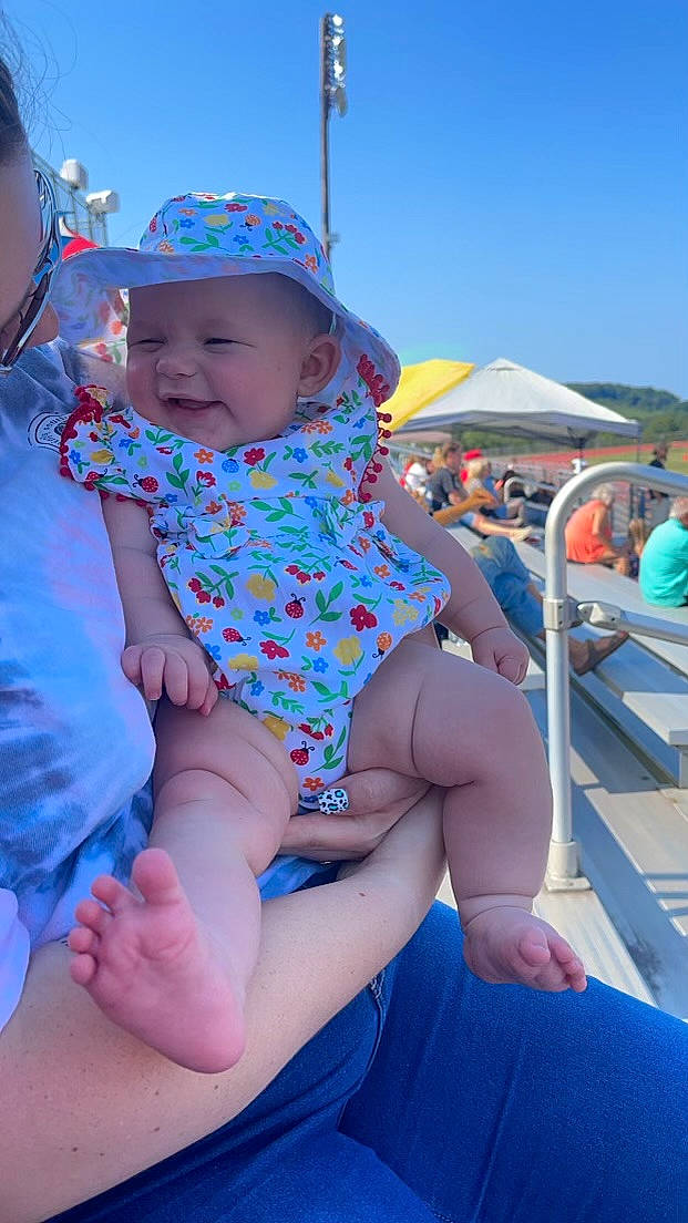 Maddilyn joined the competition — help win amazing prizes! azure, baby_toddler_clothing, blue, finger, fun, happy, hat, headwear, leg, leisure, mouth, muscle, person, pink, recreation, shorts, skin, sky, summer, sun_hat