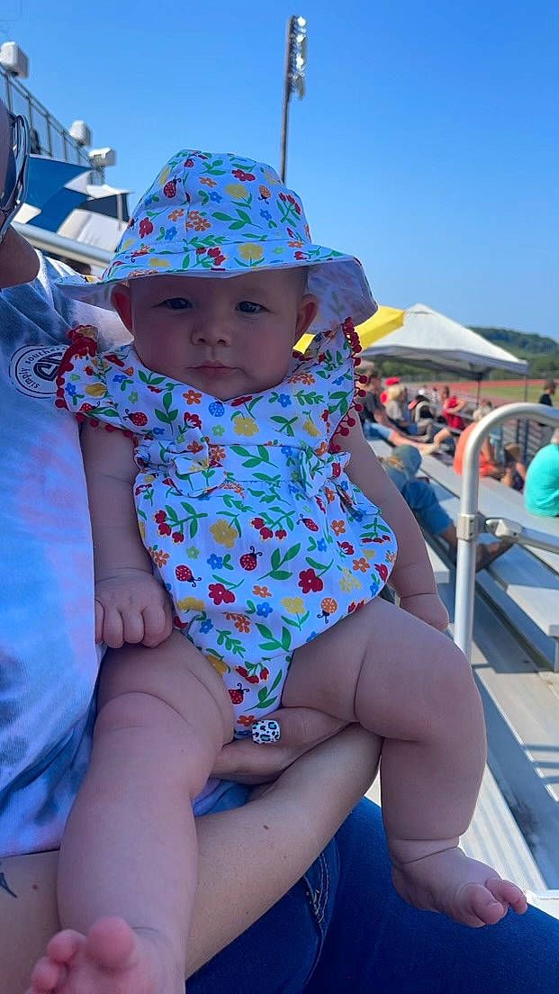 Maddilyn joined the competition — help win amazing prizes! azure, child, eye, fun, happy, hat, headgear, headwear, human_body, human_leg, leg, leisure, person, pink, recreation, skin, sky, summer, sun_hat, thigh