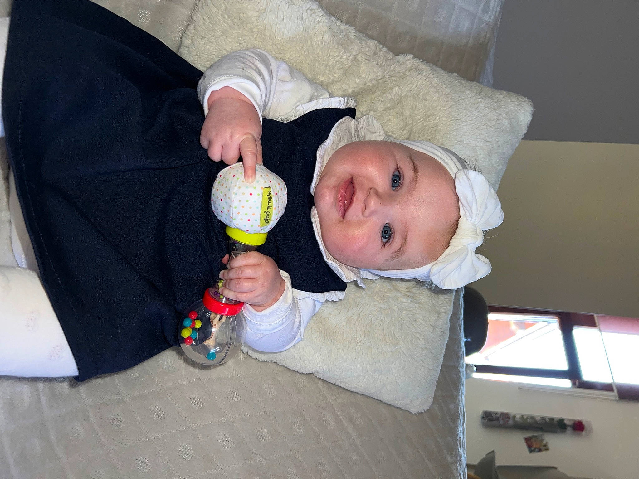 Anastasia participe au concours pour gagner de l'argent avec cette photo : baby, baby_products, baby_safety, baby_toddler_clothing, baby_toys, child, comfort, finger, headwear, person, room, sitting, sock, thumb, toddler, wood