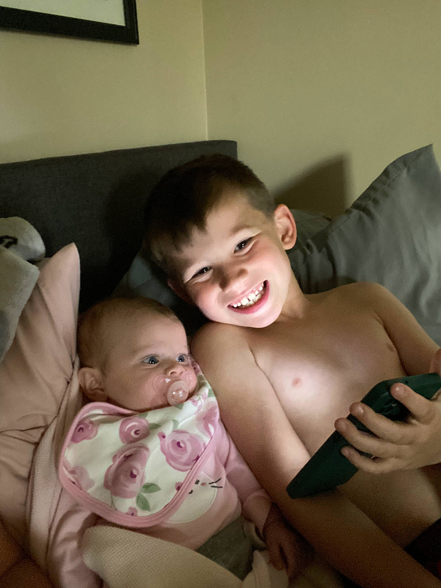 Charlee is registered to the contest to win money with this photo: arm, baby, chest, comfort, eye, finger, gesture, hand, happy, head, human_body, iris, joy, leg, mouth, muscle, neck, person, skin, smile