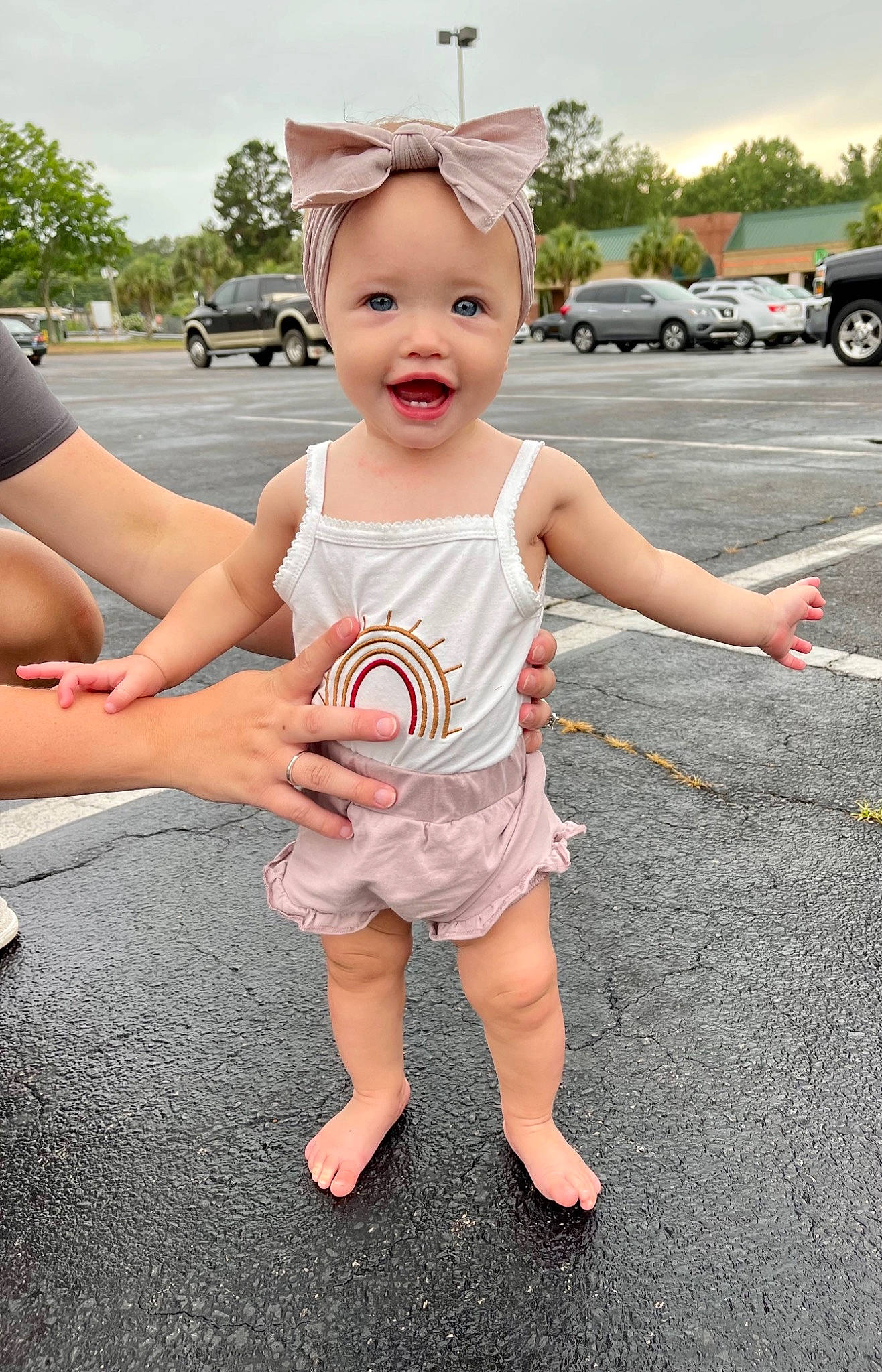 Harleigh joined the competition — help win amazing prizes! automotive_design, baby, car, child, facial_expression, fun, gesture, grass, happy, leisure, person, pink, recreation, sky, smile, t_shirt, tire, toddler, tree, vehicle