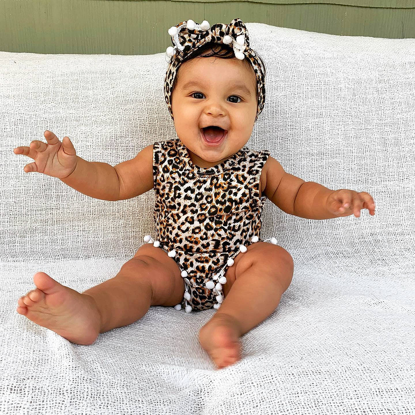 Bria is registered to the contest to win money with this photo: arm, baby, baby_bloomers, baby_products, baby_toddler_clothing, child, child_model, crown, design, hair_accessory, head, headgear, headpiece, pattern, person, photo_shoot, product, sleeve, smile, toddler