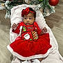 baby, christmas_tree, holiday, red_dress, red_bow, white_blanket, ornaments, green_ornaments, red_ornaments, floor, indoor, festive, cute, child, infant, sock, lace, celebration, seasonal, decor