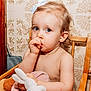 Alma participe au concours pour gagner de l'argent avec cette photo : toddler, child, thumb_sucking, stuffed_animal, high_chair, bow, hair_accessory, indoor, wooden_chair, vintage, tile_wall, door_handle, curly_hair, blue_eyes, skin, portrait, cute, baby, seated, soft_toy