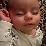 Charlotte joined the competition — help win amazing prizes! baby, sleeping, infant, blanket, leopard_print, onesie, hand, face, closed_eyes, cute, peaceful, soft, child, portrait, cozy, resting, skin, head, young, comfort