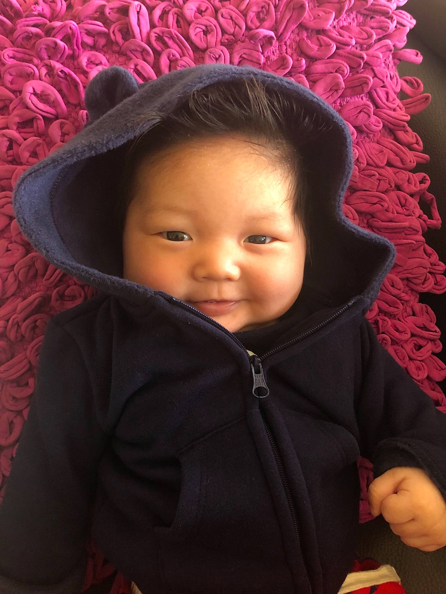 Enoch joined the competition — help win amazing prizes! baby, baby_products, cheek, child, child_model, eye, face, fashion_accessory, hat, head, headgear, outerwear, person, pink, skin, smile, toddler, wool
