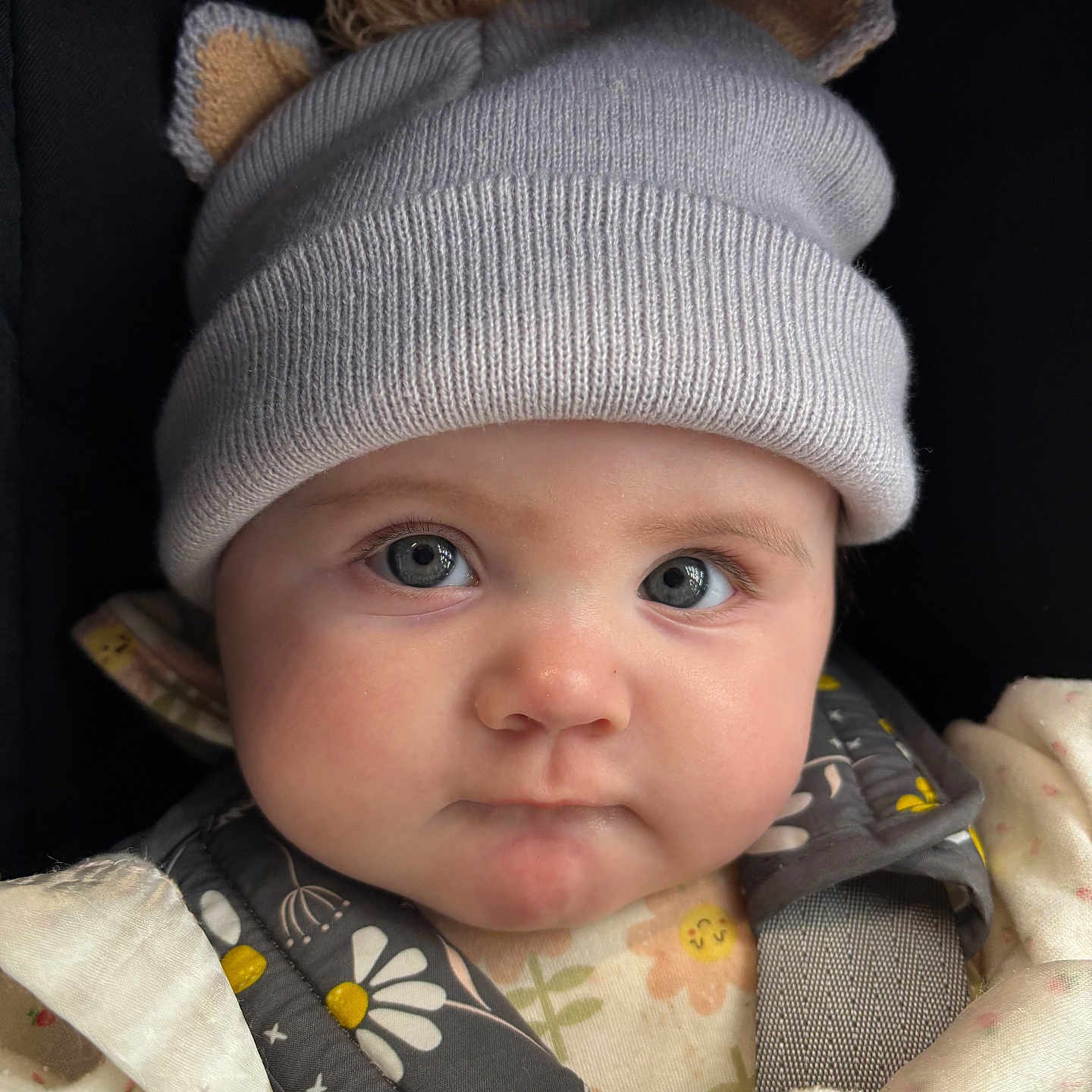 Layla is registered to the contest to win money with this photo: baby, beanie, bonnet, cap, clothing, face, fleece, hat, head, hood, hoodie, knitwear, newborn, person, photography, portrait, sweater, sweatshirt, wool