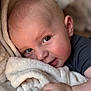 Marlonn participe au concours pour gagner de l'argent avec cette photo : baby, blanket, closeup, cuddle, cute, face, infant, light, natural_light, person, portrait, soft, toddler, young_child, skin, hand, expression, cozy, warm, indoor