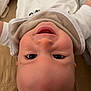 Marlonn a rejoint le concours — aidez-le/la à gagner de superbes lots ! baby, smiling, face, closeup, infant, bib, child, lying_down, happy, cute, skin, eyes, mouth, head, person, indoors, soft, clothing, expression, joy