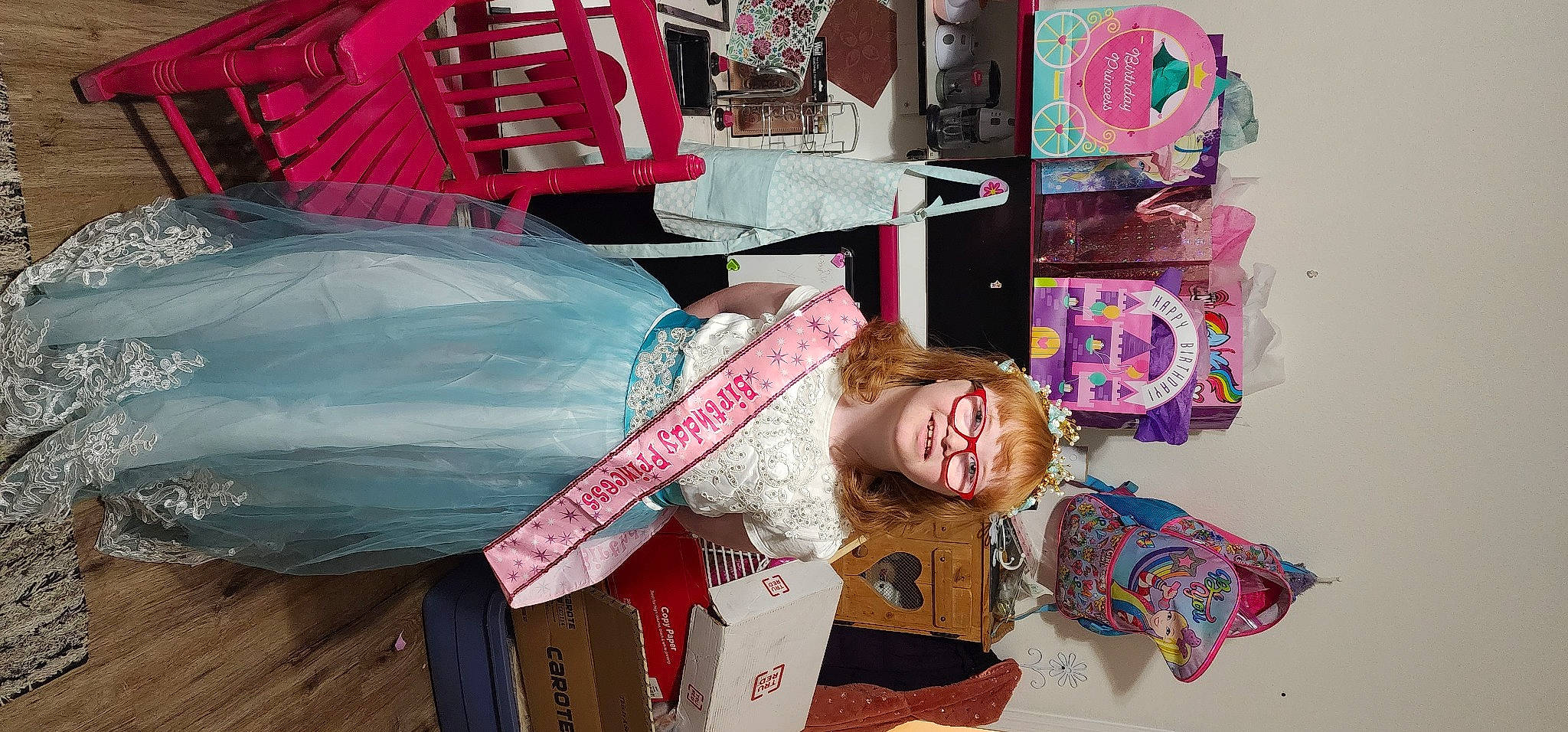 Rhylinn is registered to the contest to win money with this photo: art, automotive_design, automotive_tire, automotive_wheel_system, bumper, carmine, child, eyewear, fashion_accessory, fashion_design, font, joy, magenta, motor_vehicle, pattern, peach, person, pink, room, tire