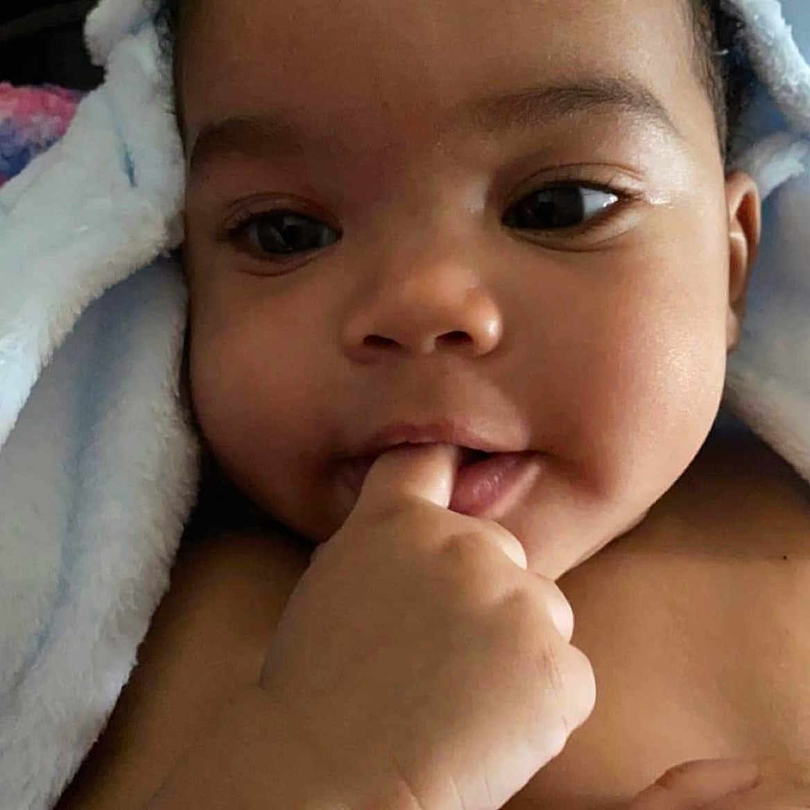 Rahmond Jr. joined the competition — help win amazing prizes! arm, baby, cheek, chin, eye, eyebrow, eyelash, face, facial_expression, gesture, hand, head, iris, lip, mouth, nose, organ, skin, smile, white